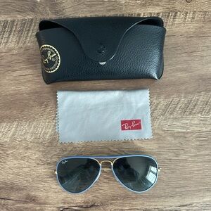 Rayban Aviator sunglasses with a periwinkle rim